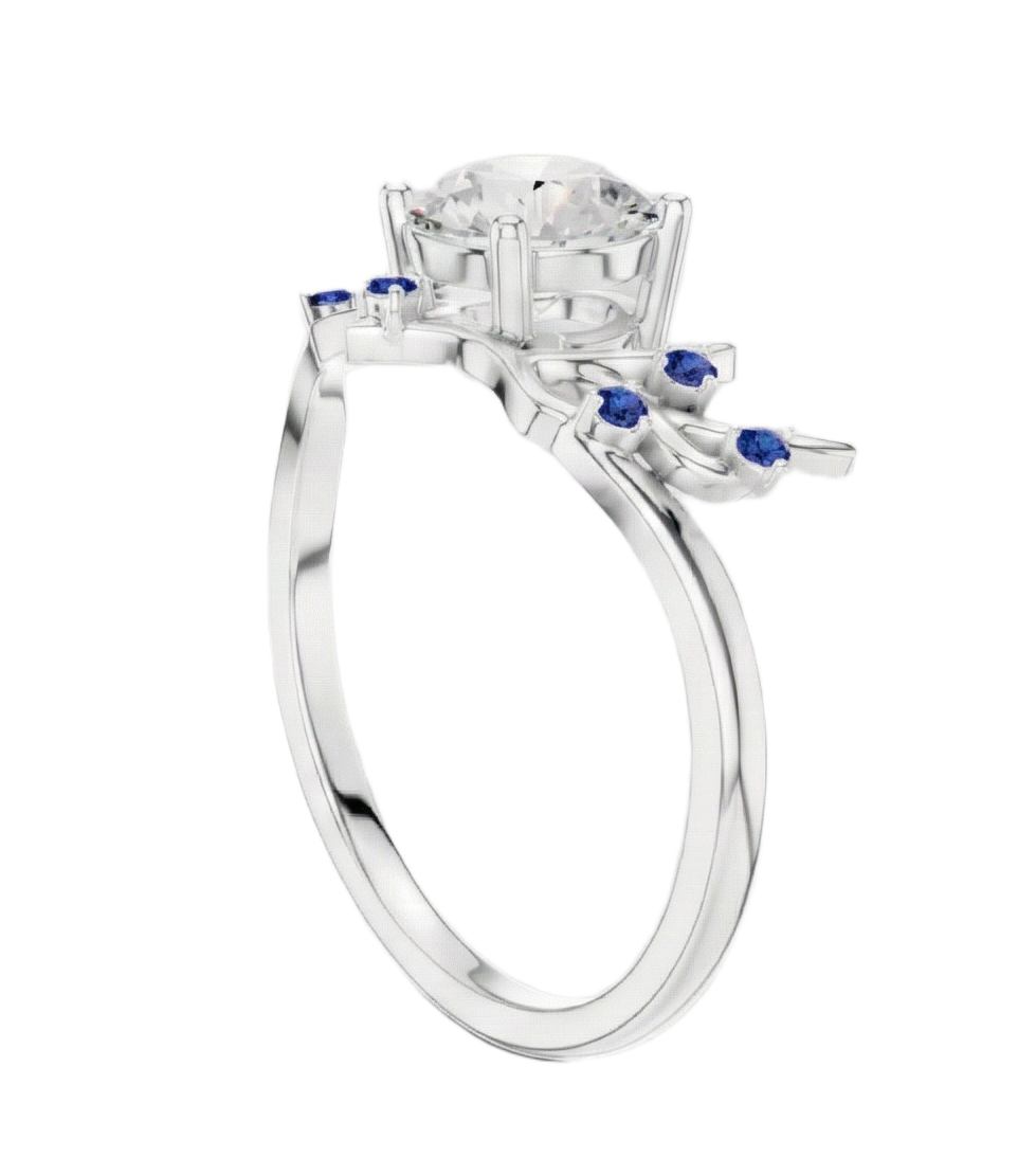 Silver ring with a central diamond and blue gemstones on a white background