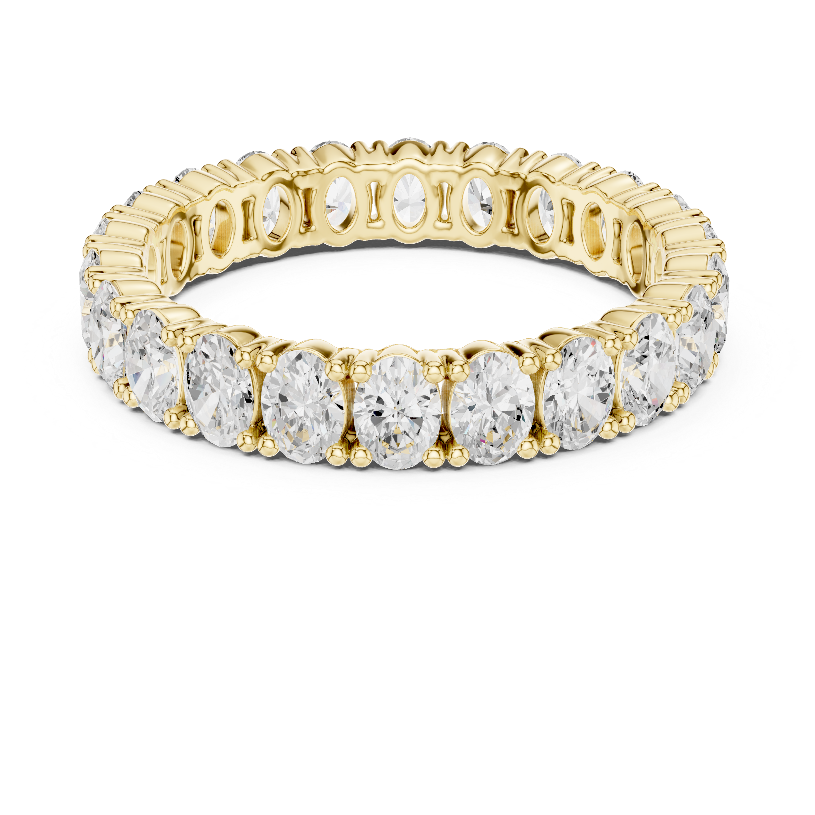 Gold ring with clear gemstones on a white background