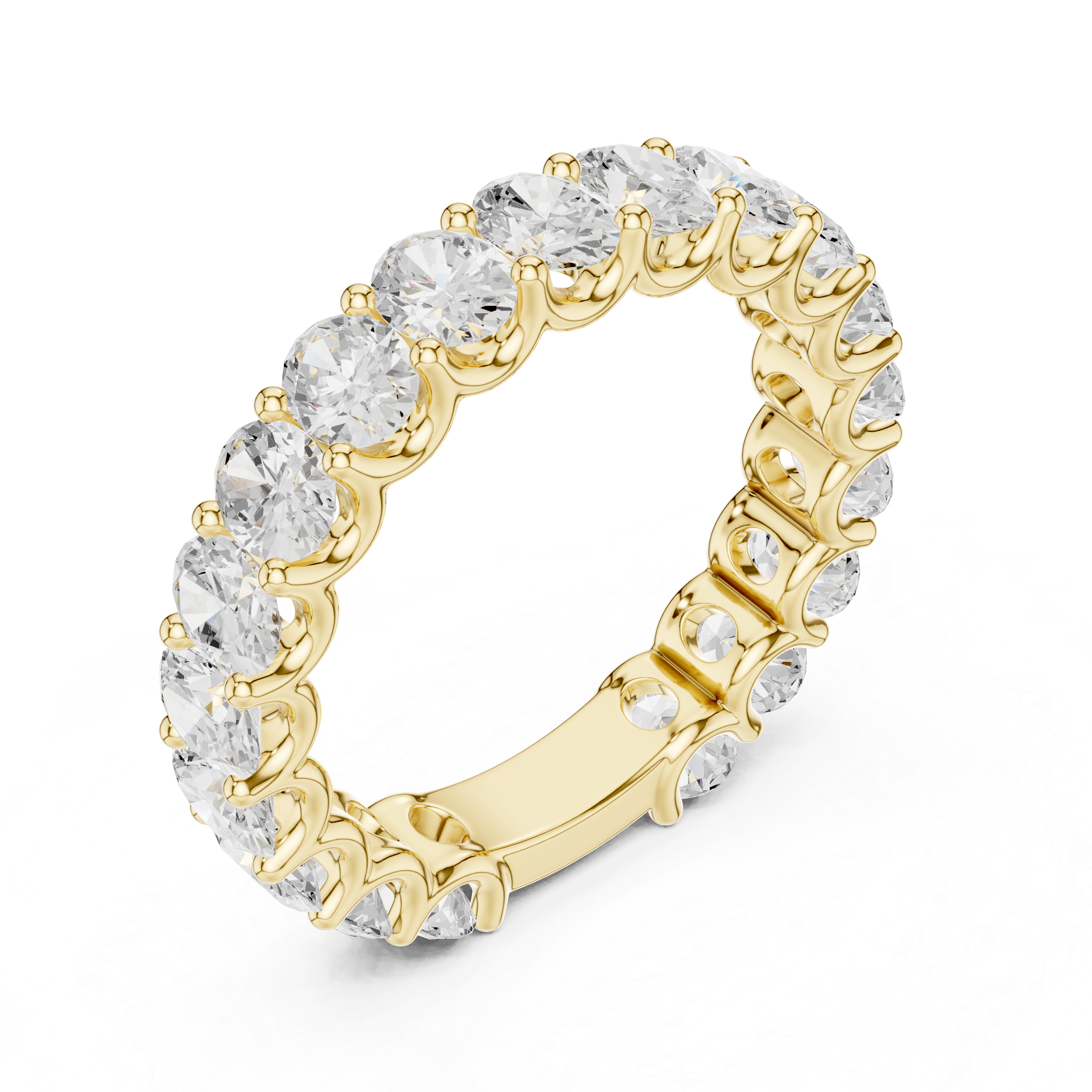 Gold ring with clear gemstones on a white background