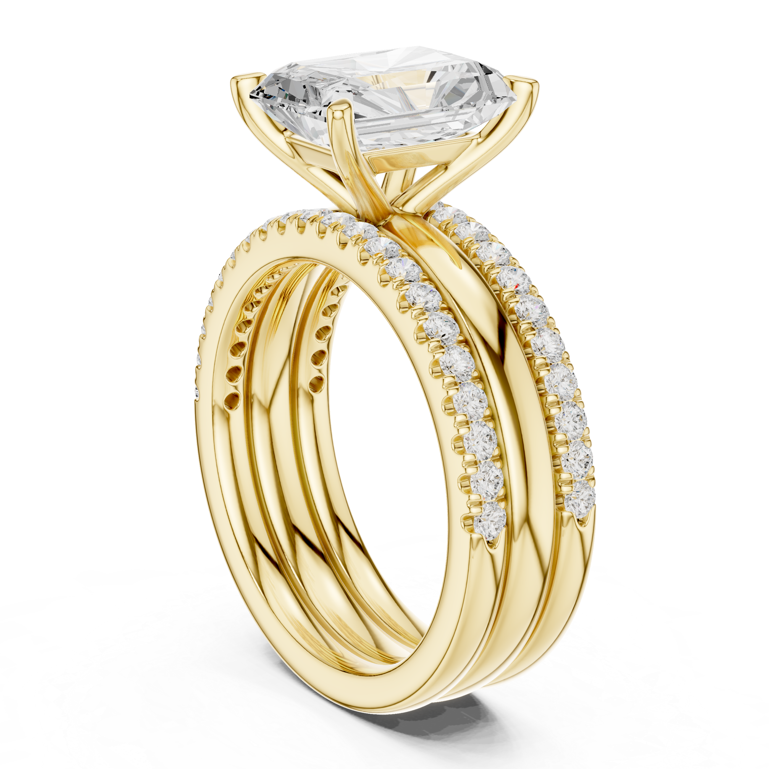 Gold ring with a large diamond and smaller diamonds on the band against a white background