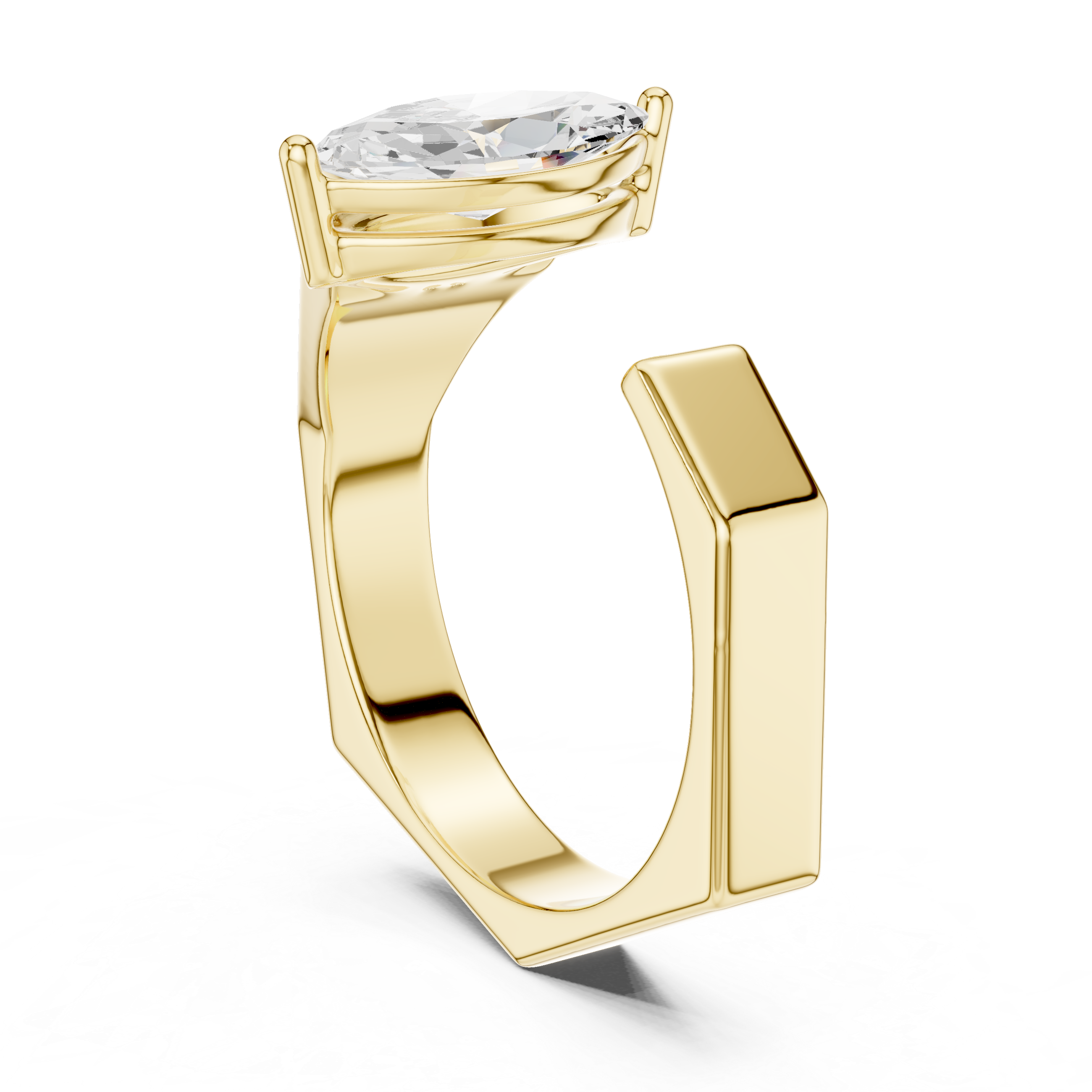 Gold ring with a clear gemstone on a white background