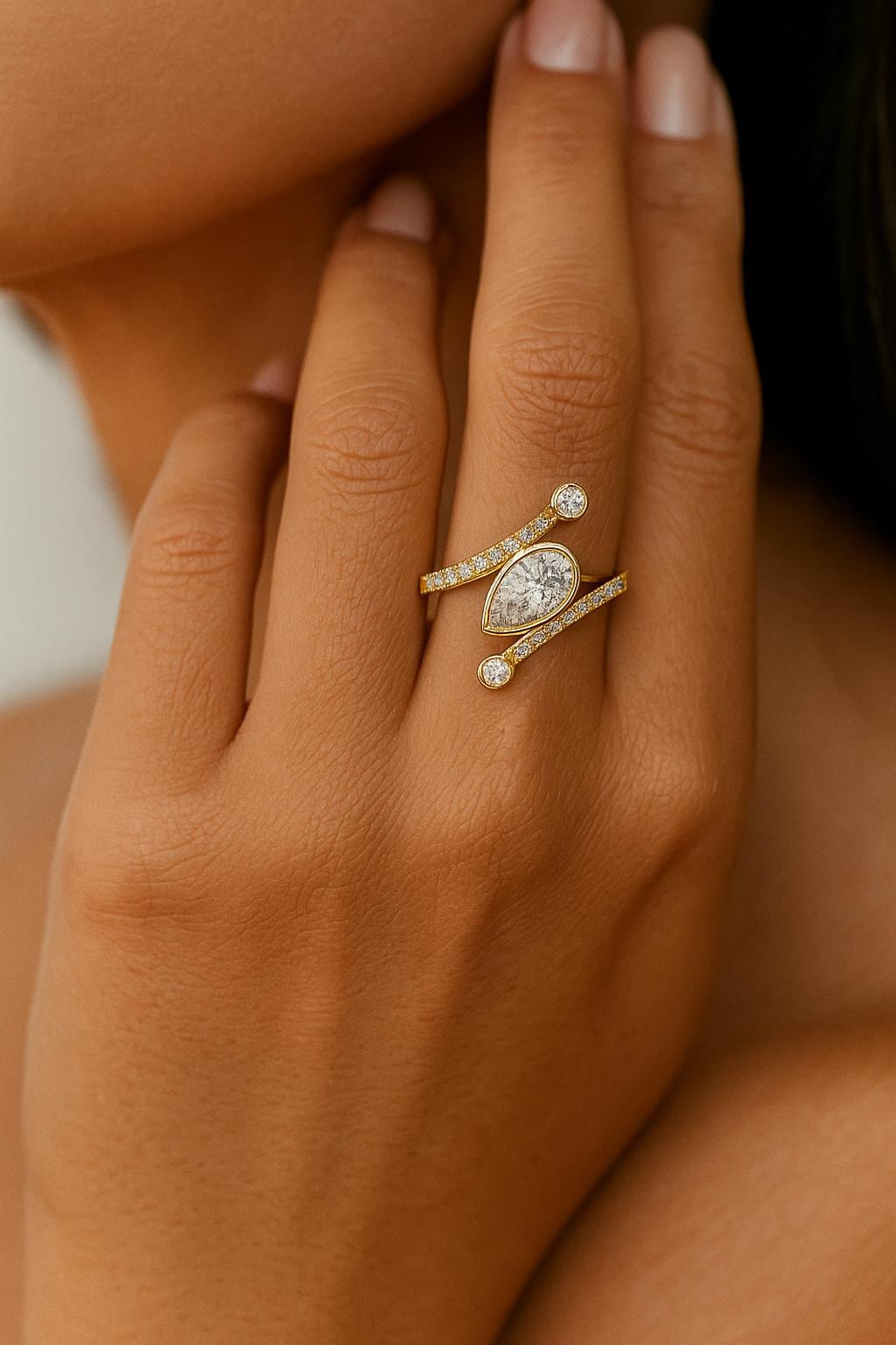 Pear and Round Diamond Bypass Ring