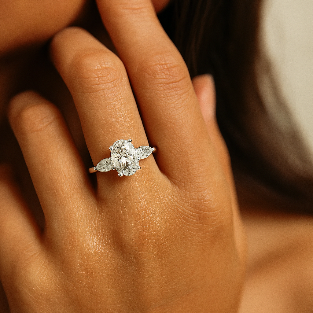 Oval & Pear Three-Stone Ring