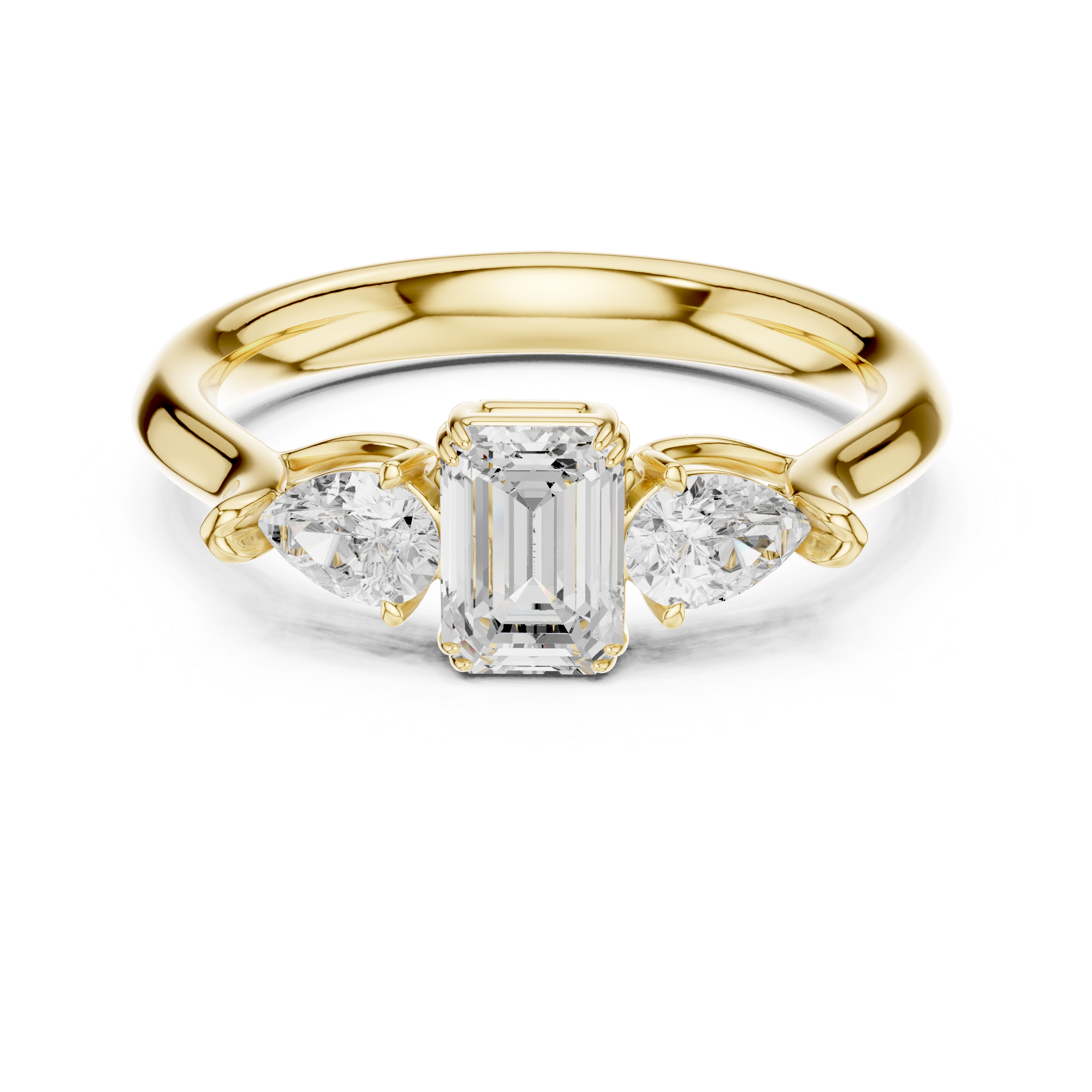 Gold ring with emerald-cut diamond and pear-shaped side stones on a white background