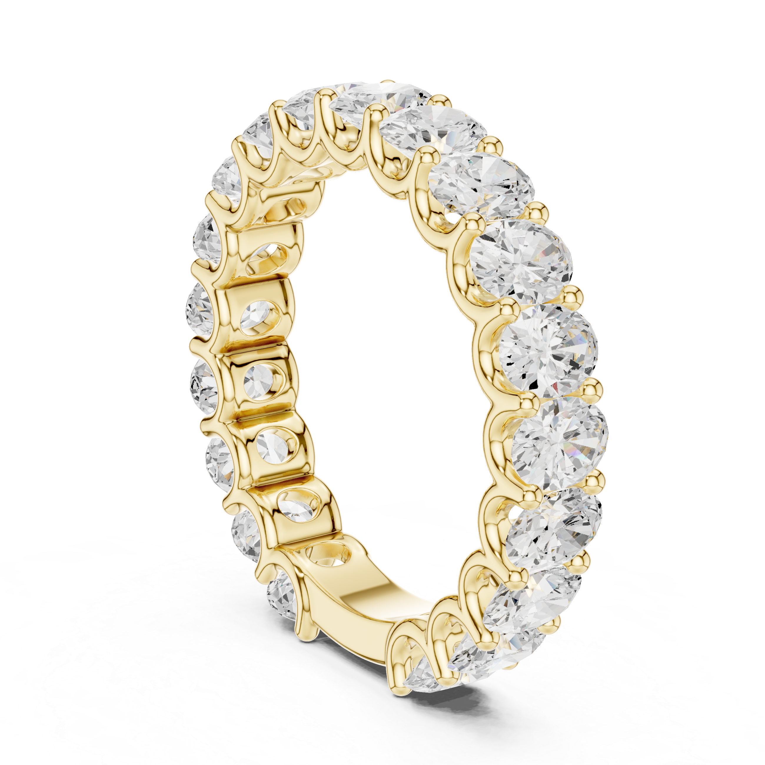 Gold ring with clear gemstones on a white background