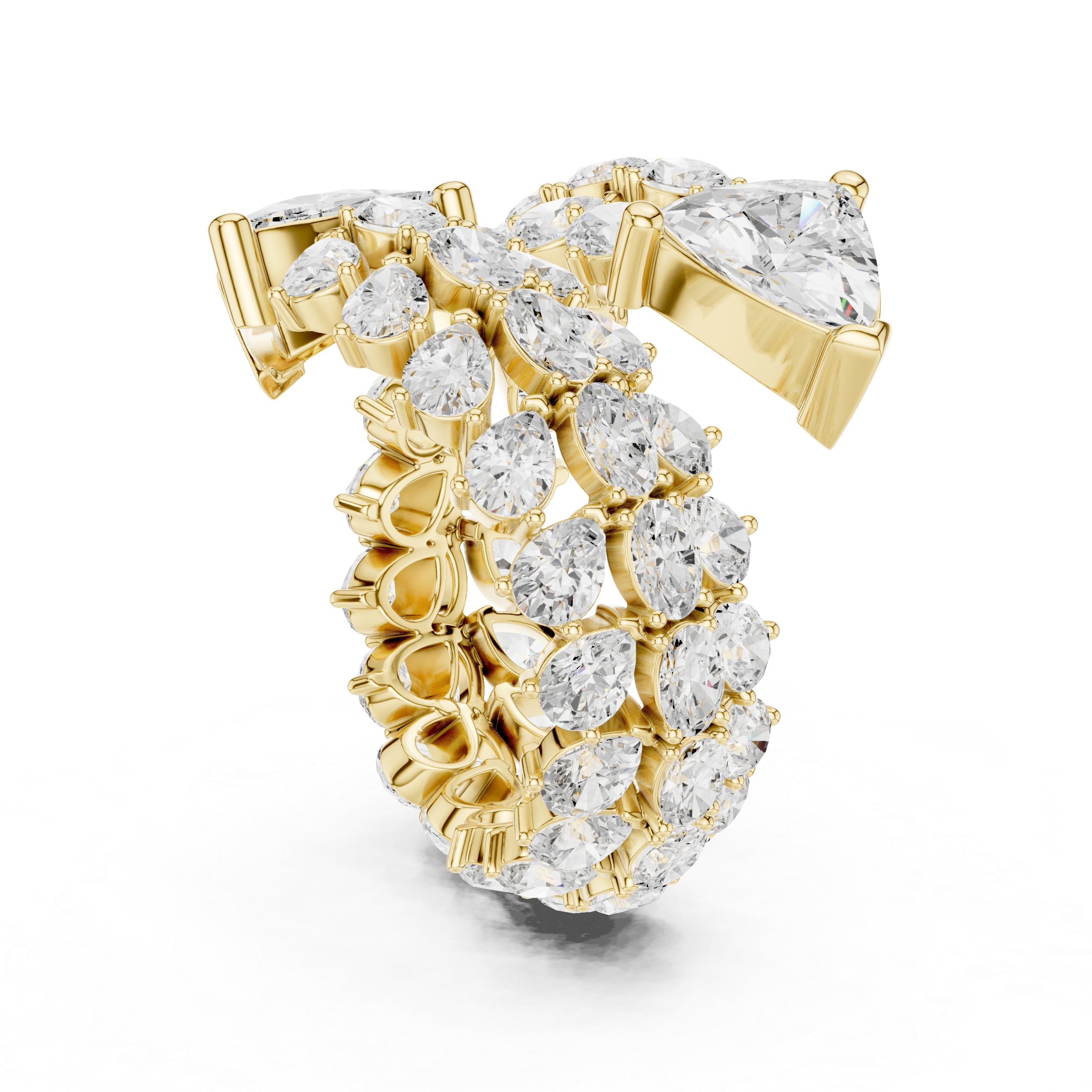 Gold ring with pear-shaped diamonds on a white background