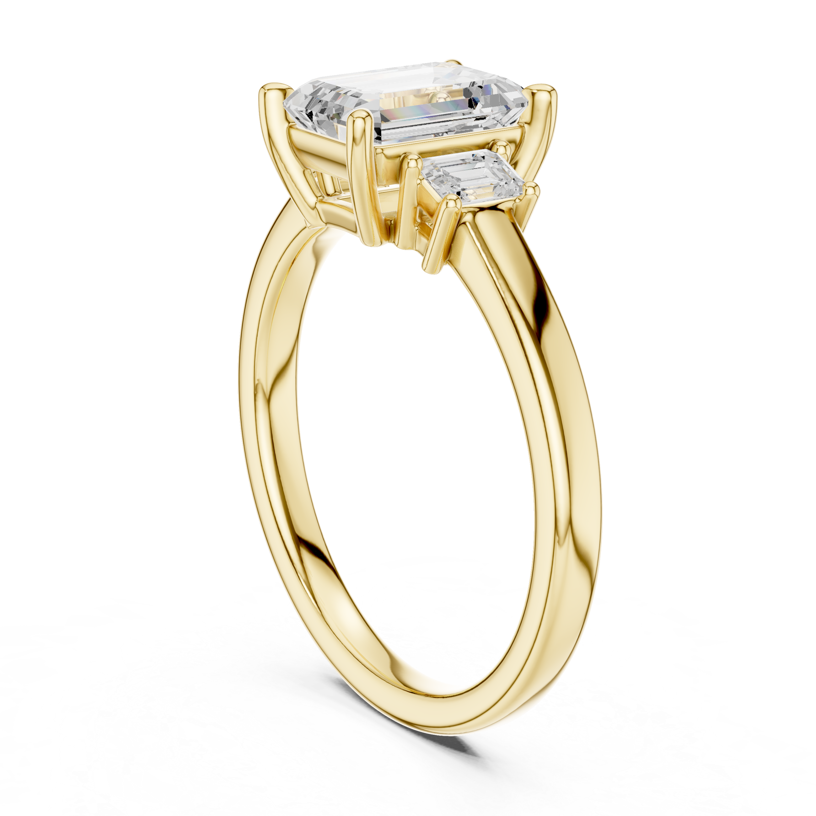 Gold ring with three diamond stones on a white background