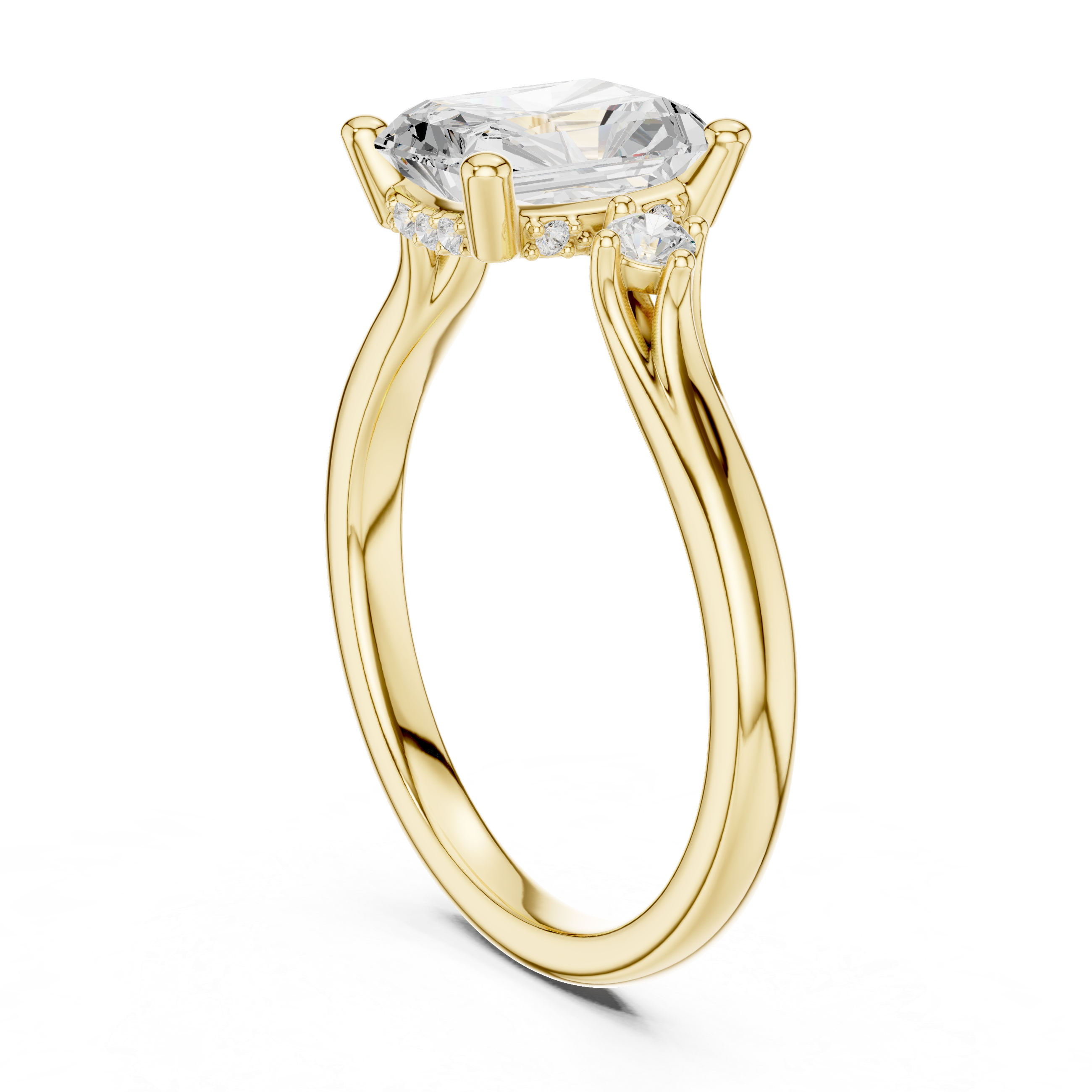 Gold ring with a large diamond and smaller diamonds on the sides against a white background